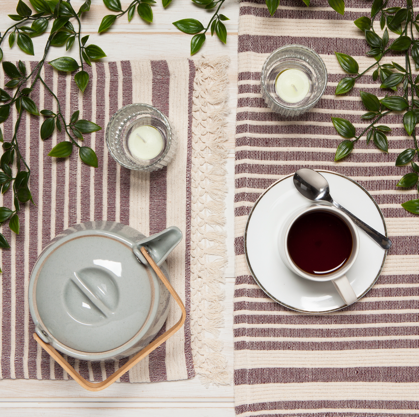 This handwoven soft cotton placemat features tactile stripes that add a sophisticated touch. A delicate tied fringe complements the design
